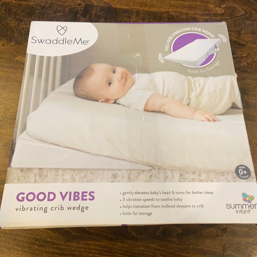 Vibrating crib wedge like new condition.